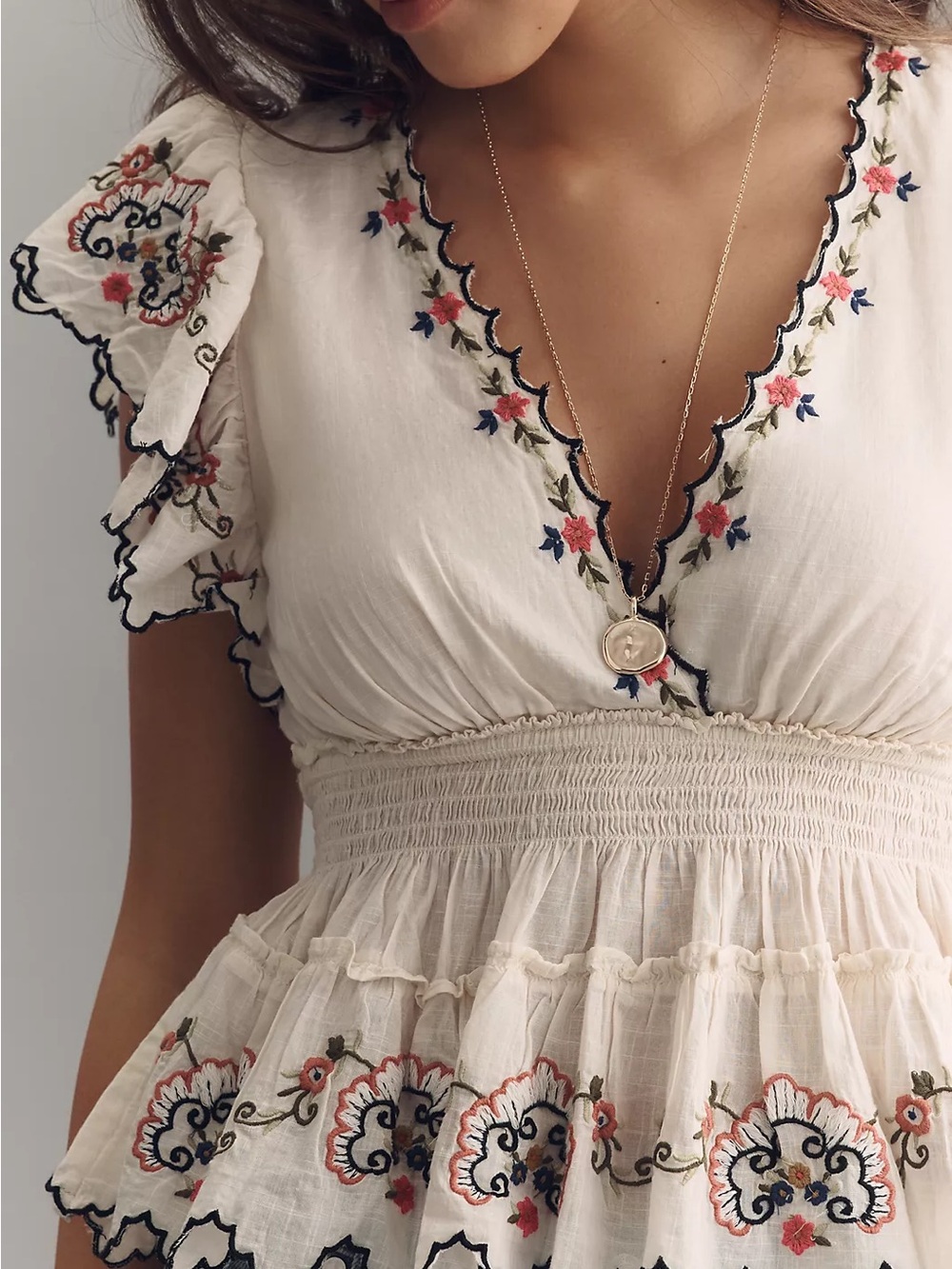 Anthropologie Cream Embroidered Peplum Ruffle Top